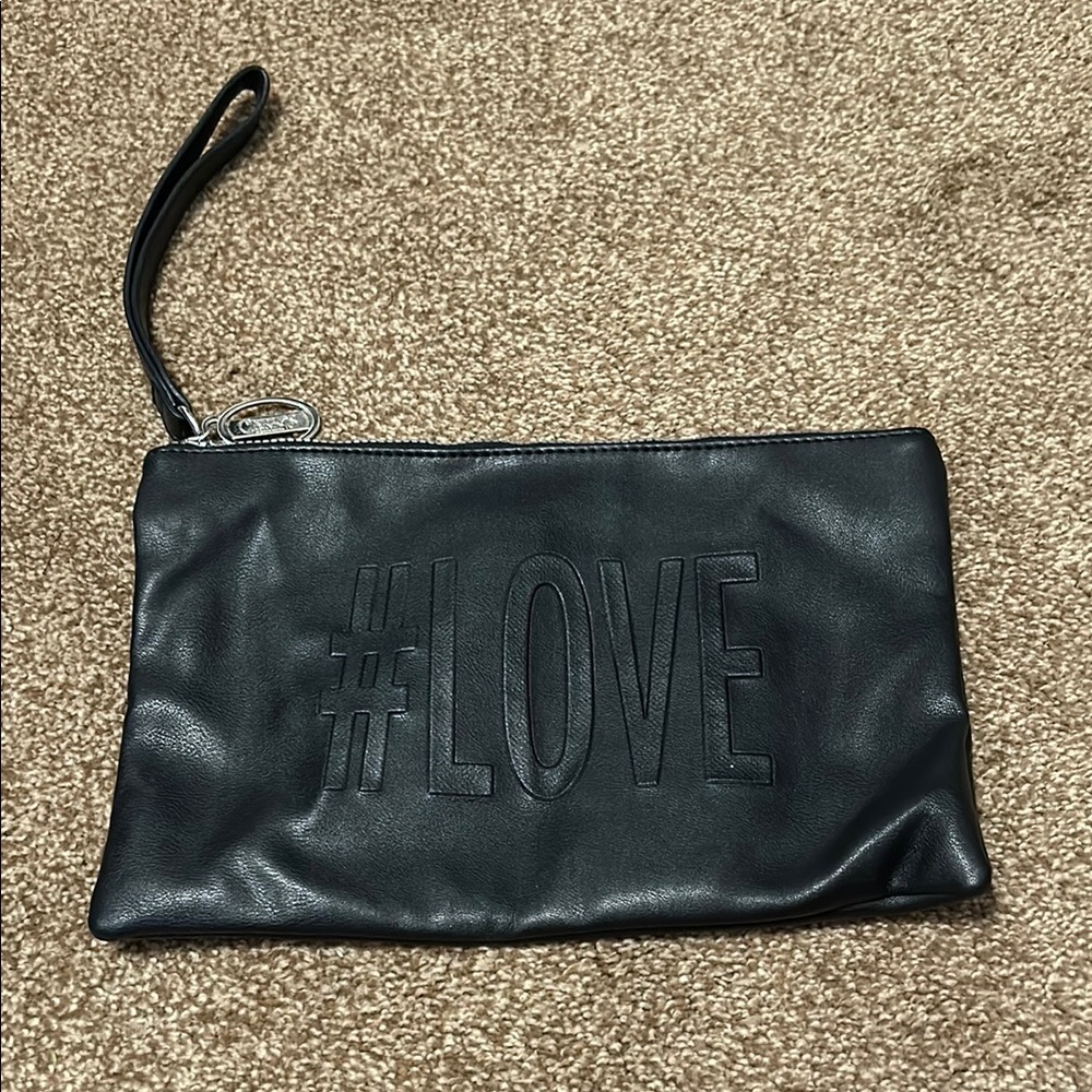 Carlos Black and Tan Floral Wristlet Clutch